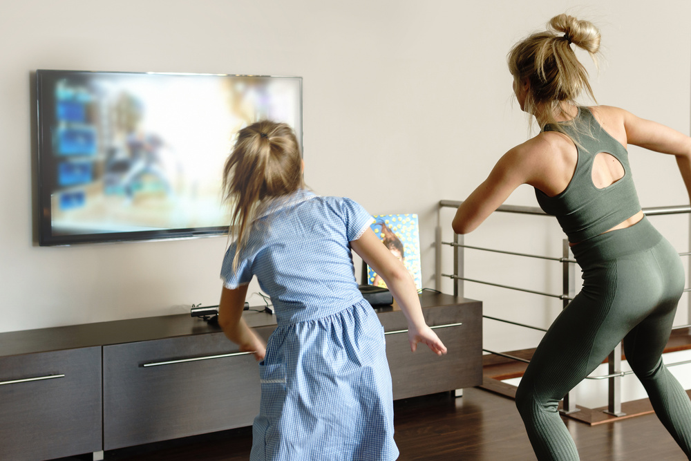 Dancing with Modern Video Game Console at Home
